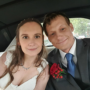 Lauren and Josh in the wedding car Lauren and Josh in the wedding car